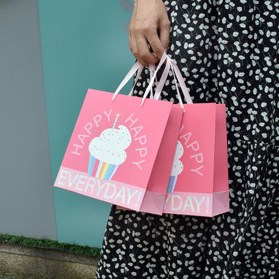 kaufen Pink Cute Cartoon Paper Tote Bags Englische Briefe Handgeführte Backpackungstüte online manufacture