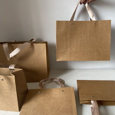 acheter Sacs fourre-tout en papier épais Sac de magasinage universel pour vêtements Portable online manufacture