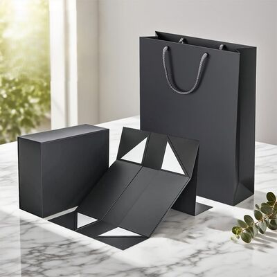 comprar Bolsa de compras de lujo embalaje de cartón de primera calidad con asas de cuerda de plata ideal para regalos festivos diseño elegante resistente online manufacture